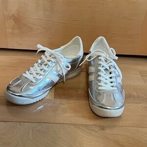 Metallic silver and white sneakers. New, worn once.